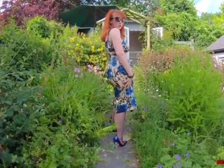 Busty cookie Red XXX Fingers herself in the Garden